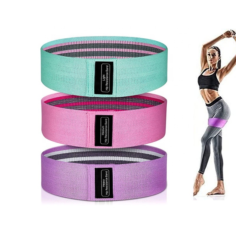 Three fabric hip resistance bands in mint, pink and purple labelled light, medium and heavy
